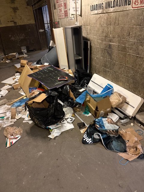 BEFORE - Junk removal from store in Center City with underground trash disposal.