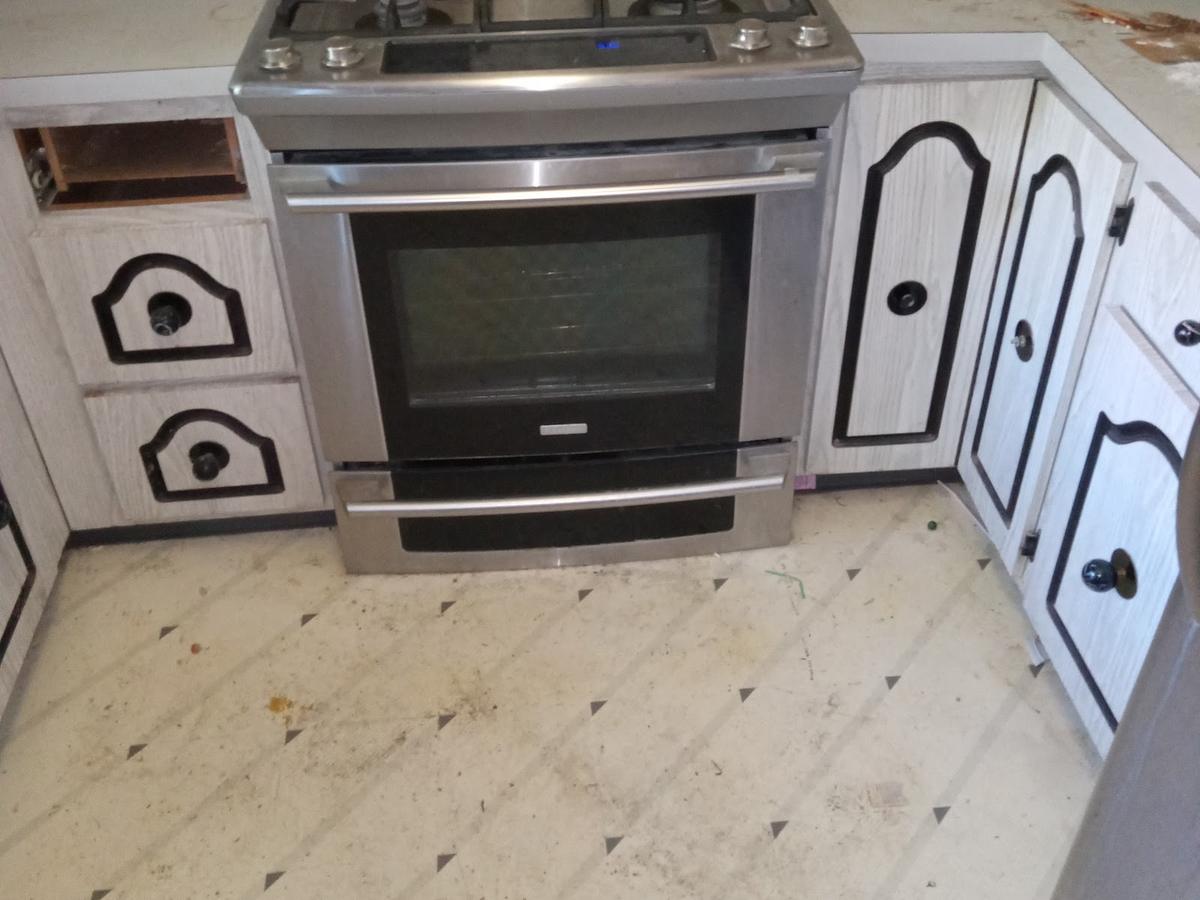 A kitchen after an MCM clean out, with the floor and counters completely cleared